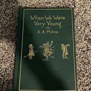 green and gold book contains poems!